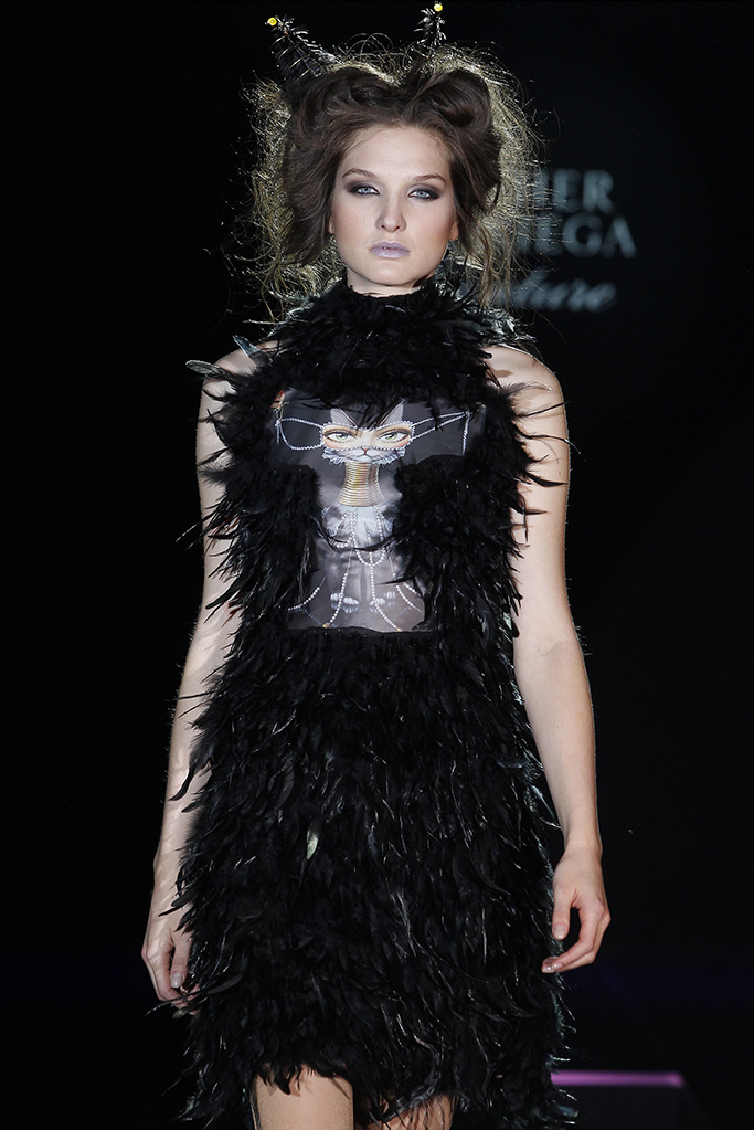 model in a couture dress with leila ataya's art work printed on it